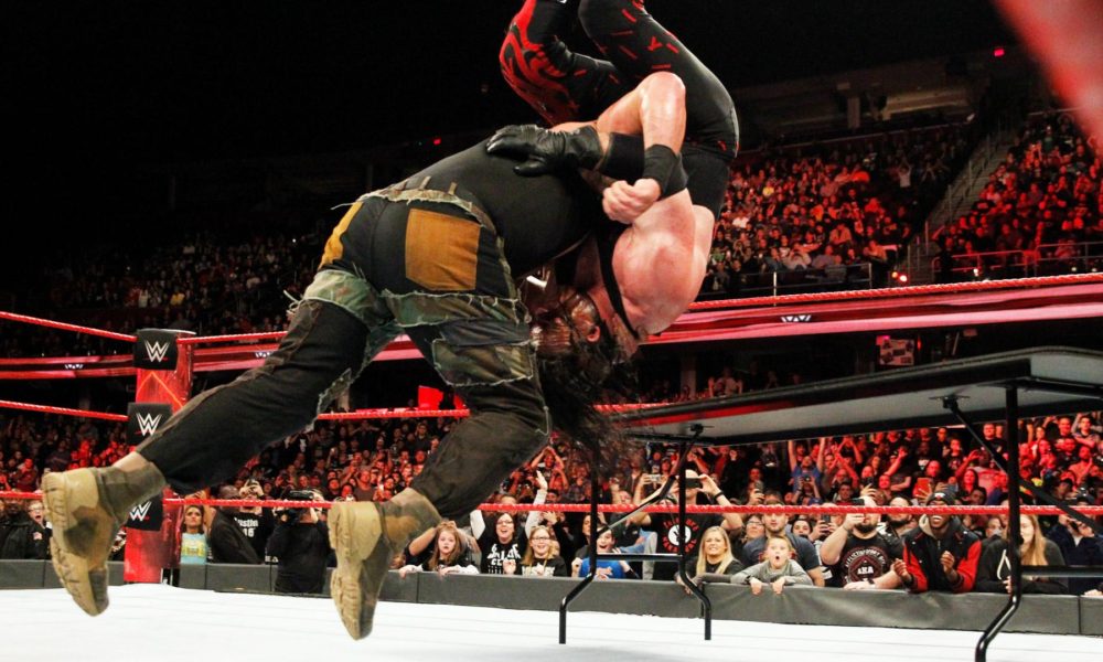 WWE Raw Braun Strowman Kane Table